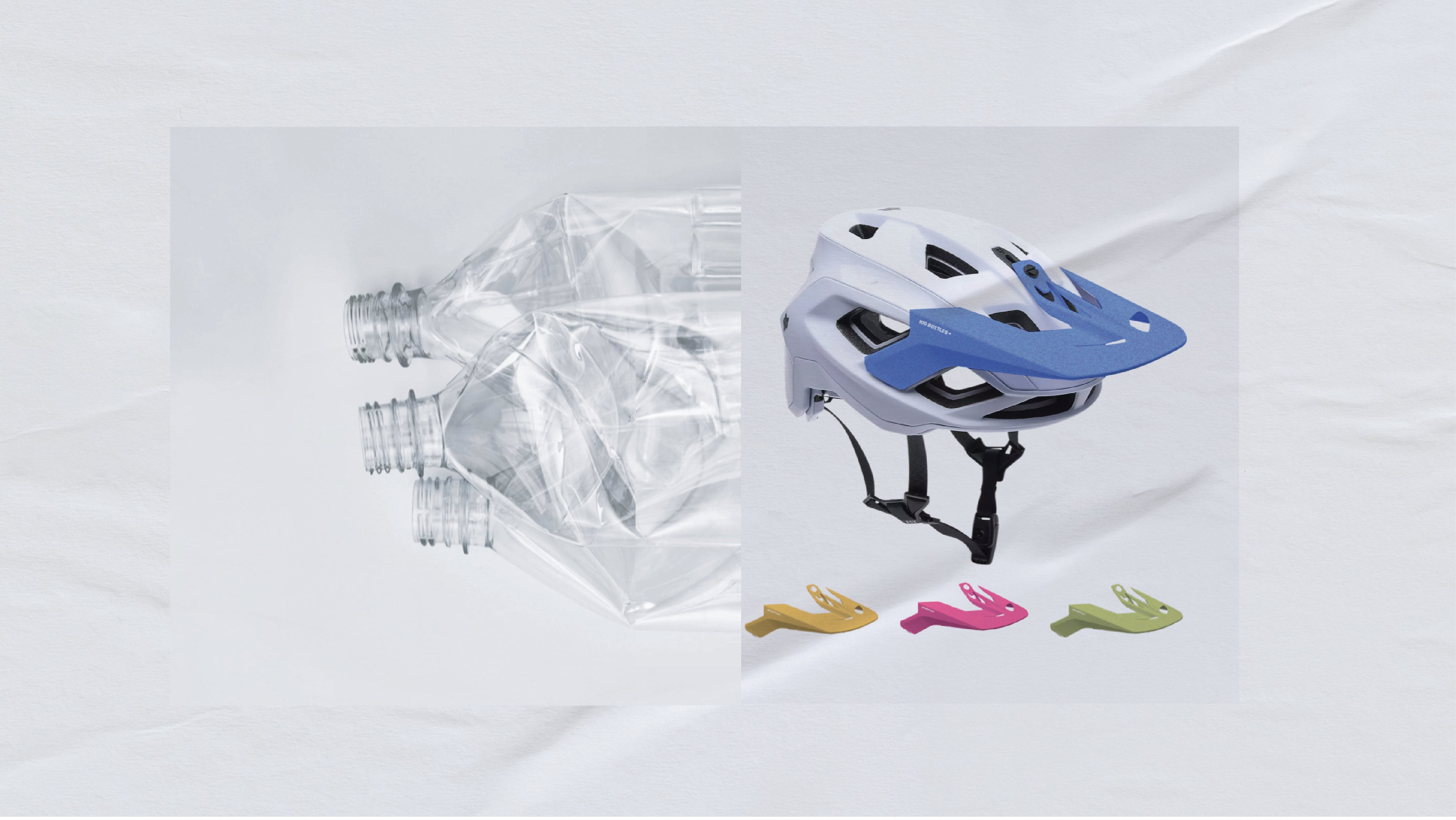 Recovered plastic water bottles next to a bike helmet with visors injection-molded from StokedPlastic