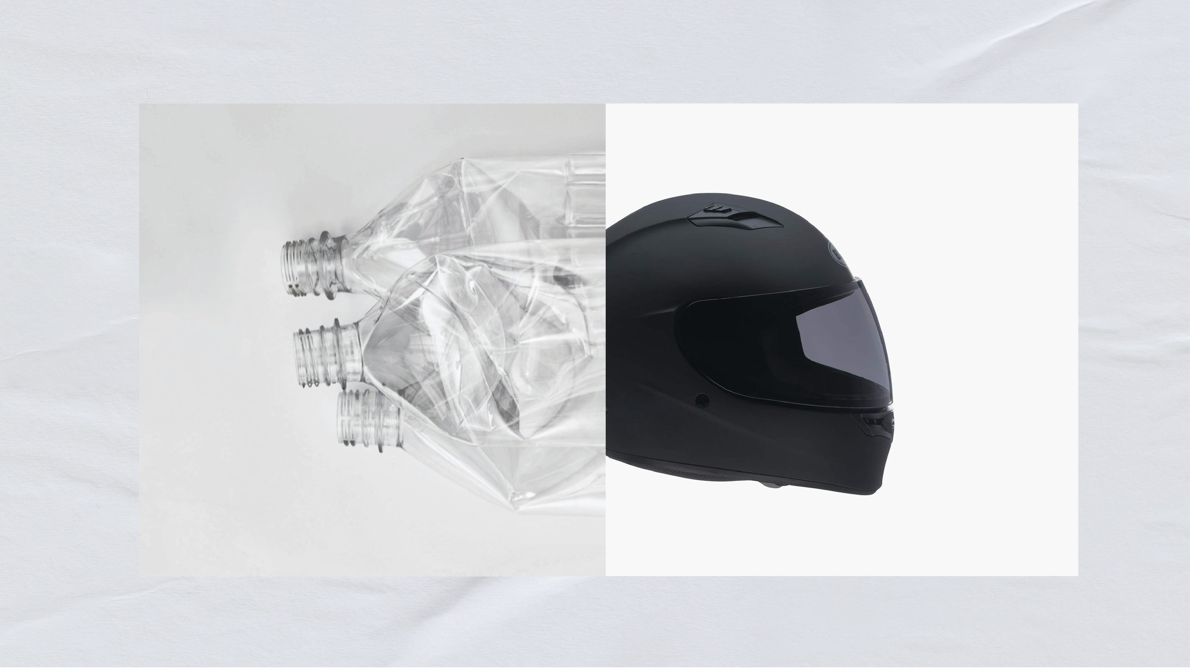 Recovered plastic bottles next to a matte black motorcycle helmet